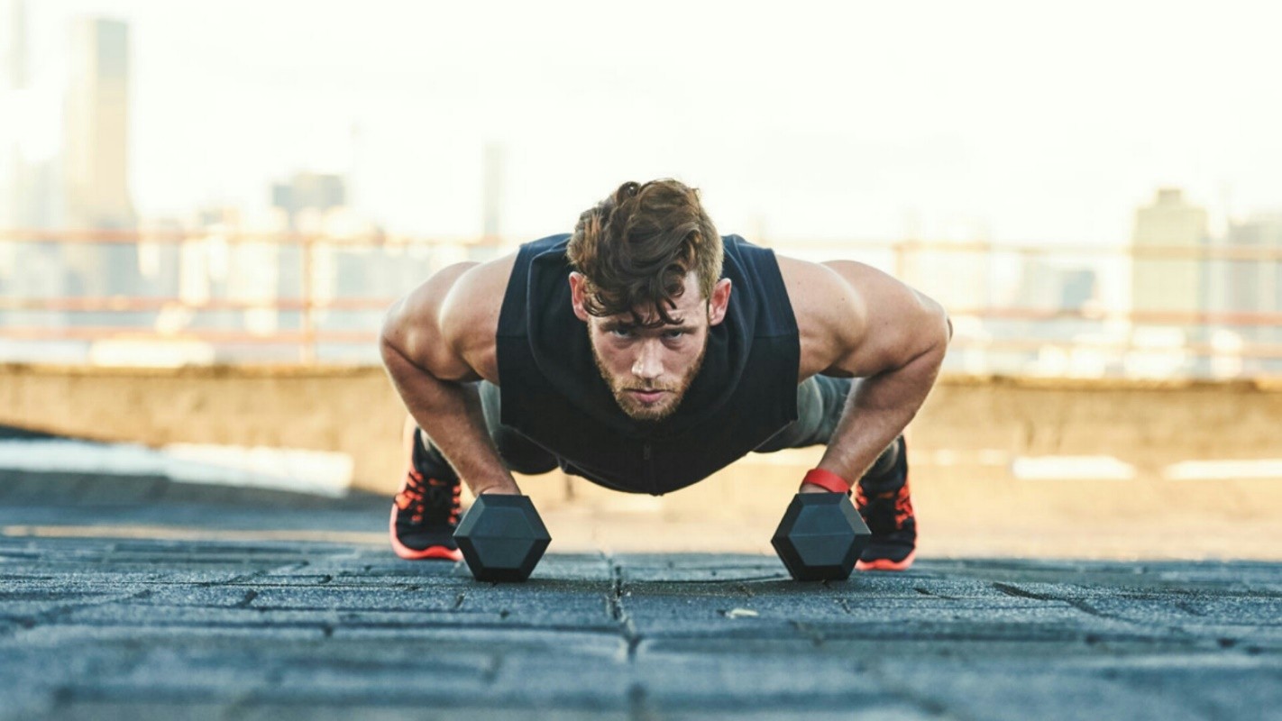 Without a bench: 9 exercises with dumbbells on the chest